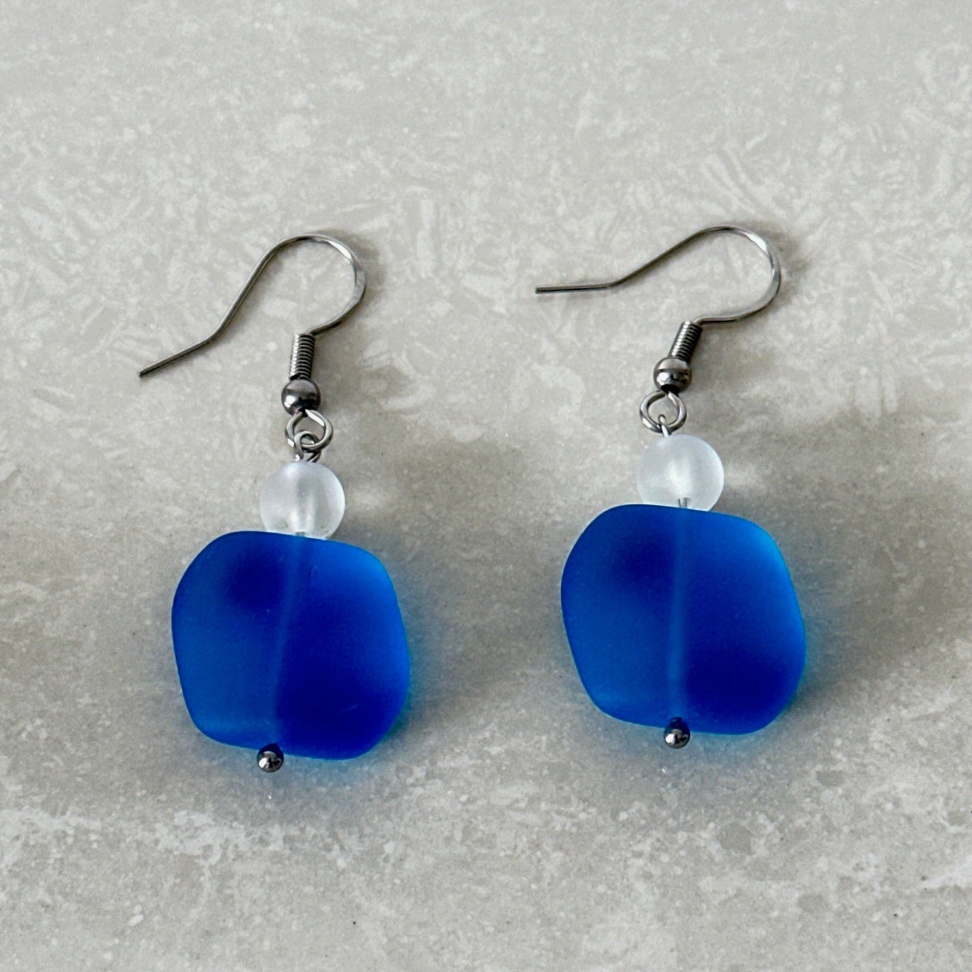 Ocean-inspired earrings showcasing beautiful beach-style glass - Uplift Beads