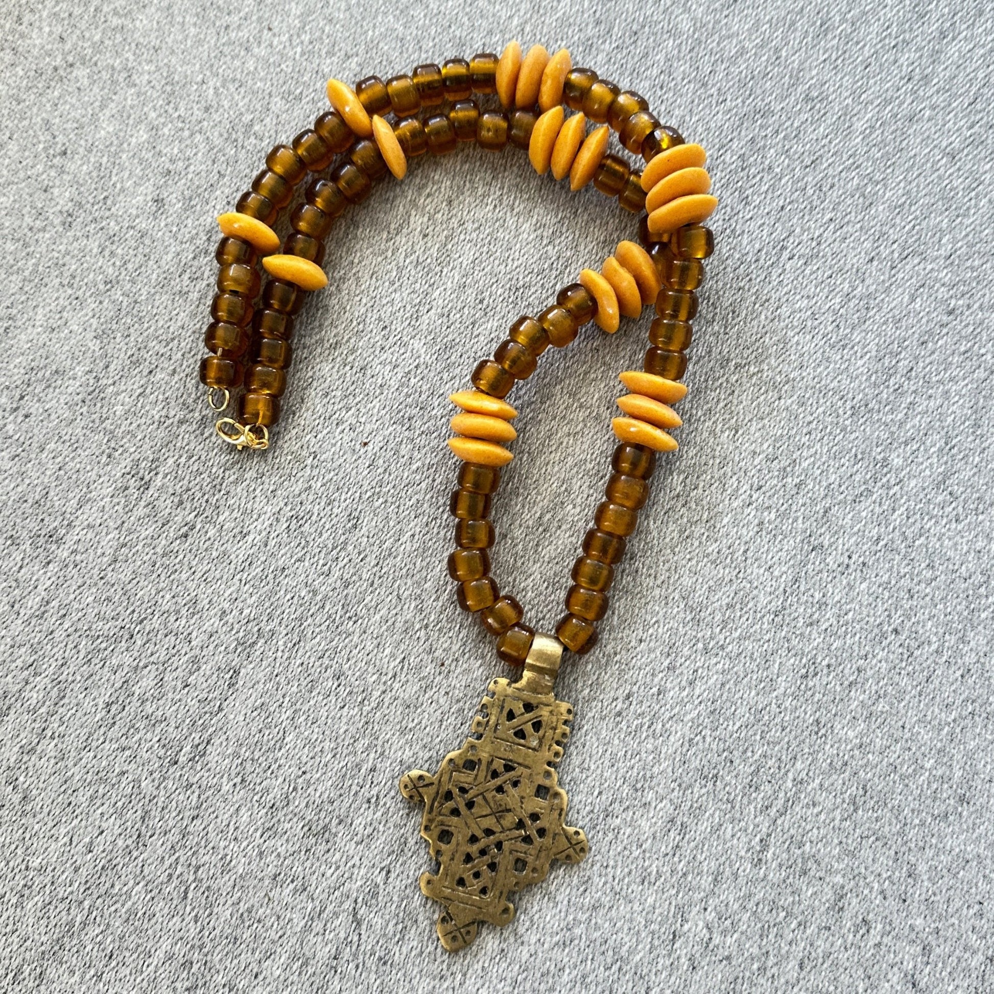 Handmade Ethiopian Cross Necklace featuring an intricate cross pendant - Uplift Beads