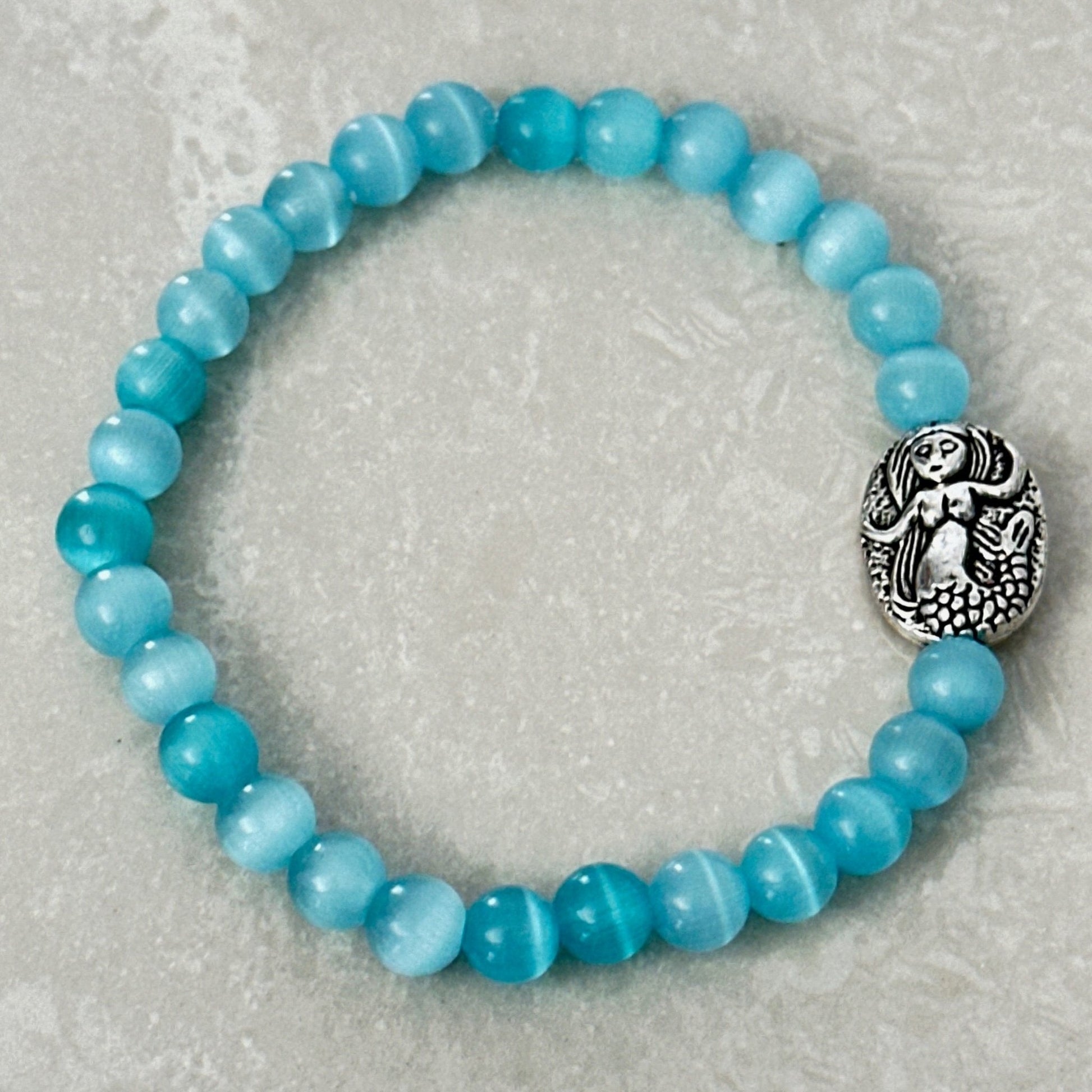 Ocean inspired mermaid bracelet with symbolic charm - Uplift Beads