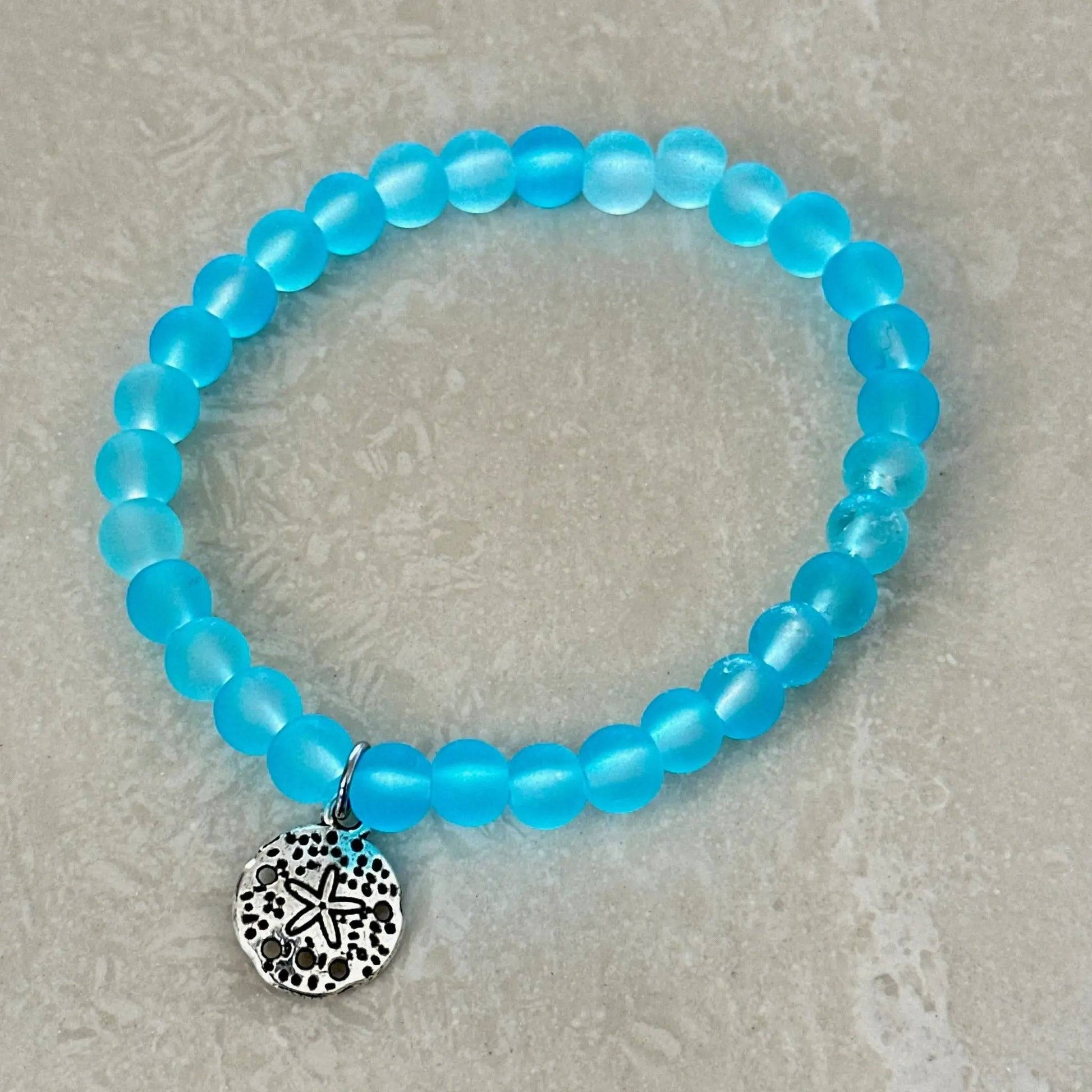 Sand Dollar Charm Bracelet featuring beach-style glass beads - Uplift Beads