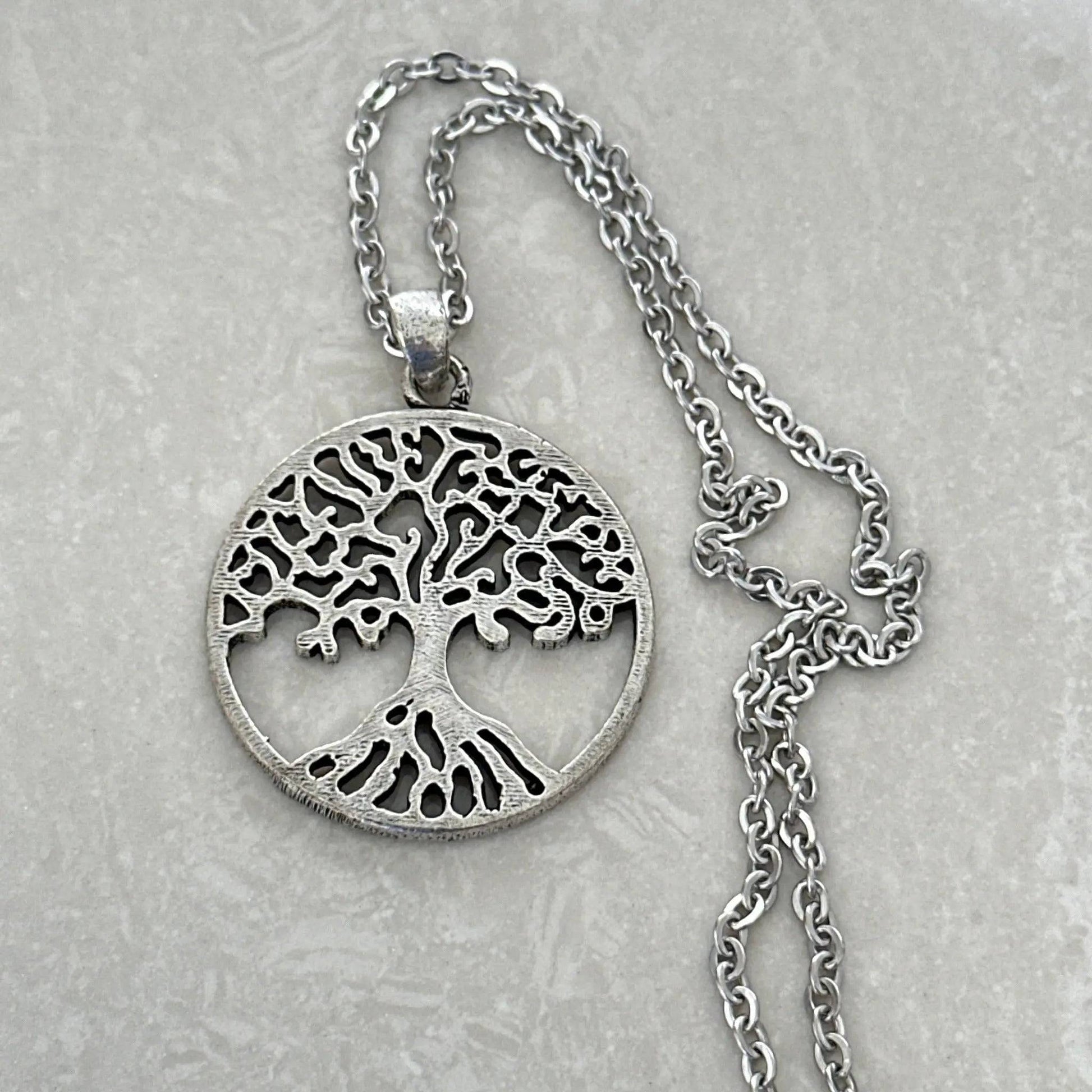 Tree of Life pendant symbolizing growth and harmony - Uplift Beads