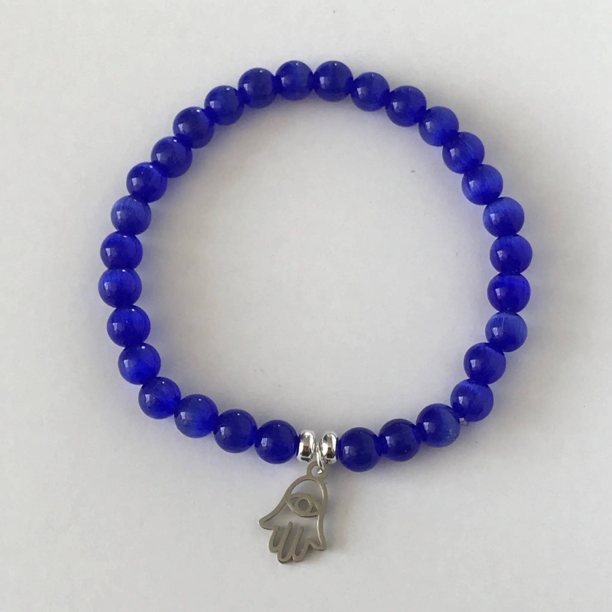 Symbolic Hamsa bracelet with radiant Cat Eye glass beads - Uplift Beads