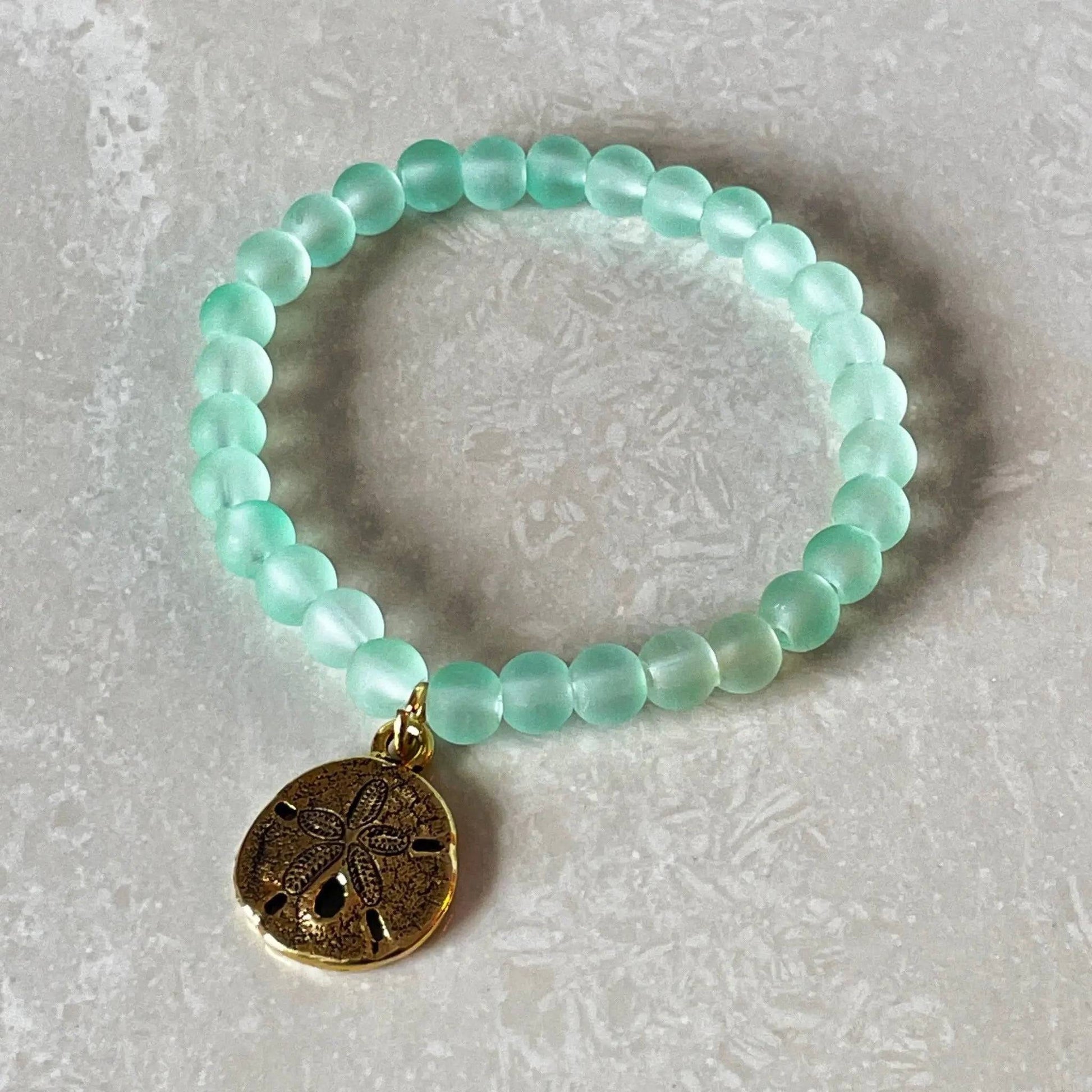 Sand Dollar Charm Bracelet featuring beach-style glass beads - Uplift Beads